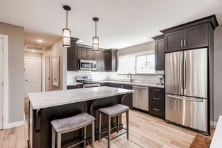 Photo 8: 4912 45 Street SW in Calgary: Glamorgan Detached for sale : MLS®# A2079602