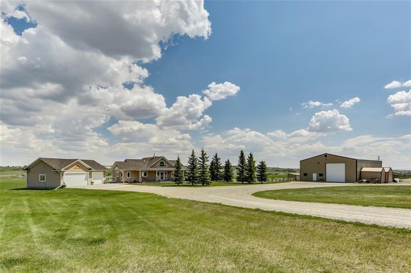 FEATURED LISTING: Okotoks 119 acres,home, shop,barn Street West Rural Foothills County