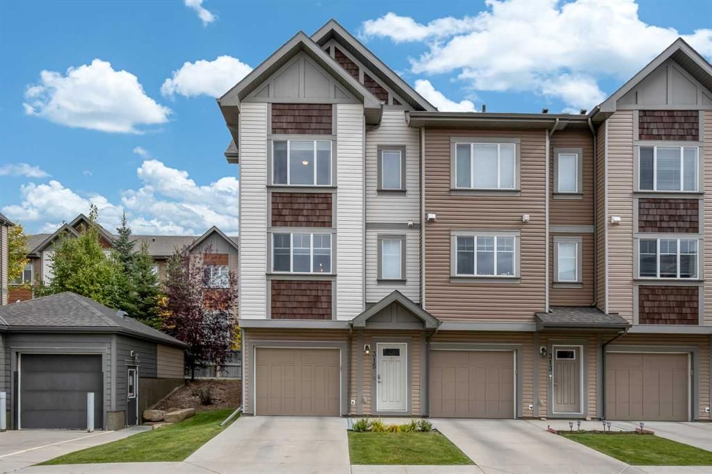 Main Photo: 315 Copperpond Row SE in Calgary: Copperfield Row/Townhouse for sale : MLS®# A2085394