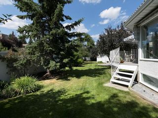 Photo 5: 33 PUMP HILL Landing SW in Calgary: Pump Hill House for sale : MLS®# C4133029