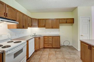 Photo 3: 114 5201 Dalhousie Drive NW in Calgary: Dalhousie Apartment for sale : MLS®# A2033698