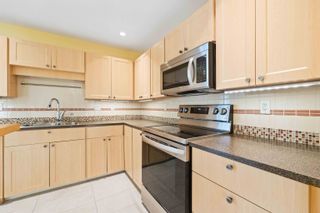 Photo 29: 205 33401 MAYFAIR Avenue in Abbotsford: Central Abbotsford Condo for sale in "Mayfair Gardens" : MLS®# R2860022