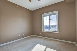 Photo 20: 1407 92 CRYSTAL SHORES Road: Okotoks Apartment for sale : MLS®# A1222250