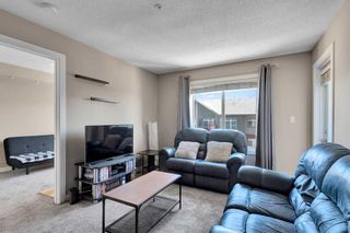 Photo 9: 1406 403 Mackenzie Way SW: Airdrie Apartment for sale : MLS®# A2131291