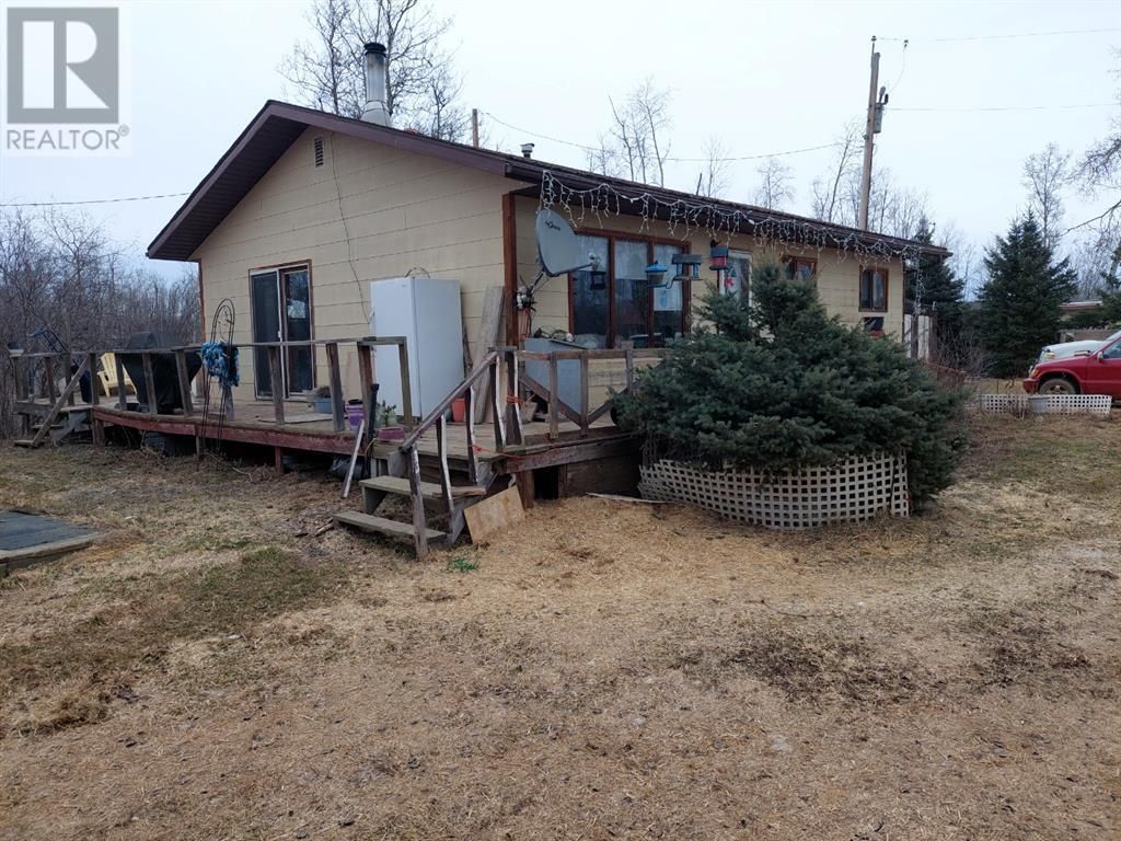 Main Photo: 13576 Township Road 1091 in Rural Mackenzie County: House for sale : MLS®# A1213660