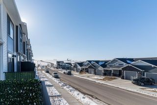 Photo 18: 12711 Crestmont Boulevard SW in Calgary: Crestmont Row/Townhouse for sale : MLS®# A2034556