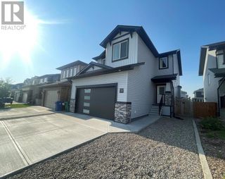 Photo 1: 4320 40 Avenue S in Lethbridge: House for sale : MLS®# A2050550