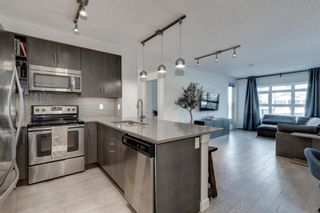 Photo 2: 125 25 Auburn Meadows Avenue SE in Calgary: Auburn Bay Apartment for sale : MLS®# A1218970