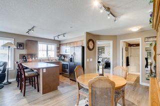 Photo 12: 1204 92 Crystal Shores Road: Okotoks Apartment for sale : MLS®# A1083634