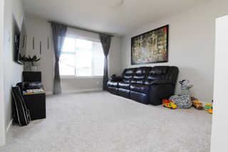 Photo 14: 2853 KOSHAL Crescent in Edmonton: House Half Duplex for sale