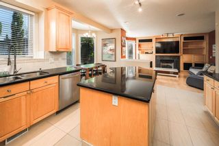 Photo 12: 116 Strathridge Place SW in Calgary: Strathcona Park Detached for sale : MLS®# A2080027