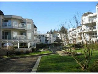 Photo 1: # 406 1219 JOHNSON ST in Coquitlam: Canyon Springs Condo for sale in "MOUNTAINSIDE PLACE" : MLS®# V868873