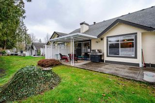 Photo 29: 19 19649 53 Avenue in Langley: Langley City Townhouse for sale in "HUNTSFIELD GREEN" : MLS®# R2748247