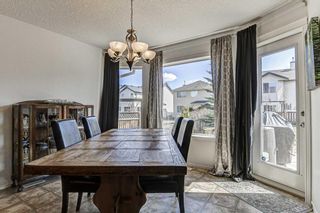 Photo 16: 28 Cougarstone Square SW in Calgary: Cougar Ridge Detached for sale : MLS®# A1099416