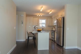 Photo 2: 1003 1225 Kings Heights Way SE: Airdrie Row/Townhouse for sale : MLS®# A1045575