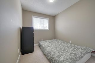 Photo 16: 555 Panatella Boulevard NW in Calgary: Panorama Hills Row/Townhouse for sale : MLS®# A2034434