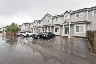 Photo 1: 511 Strathaven Mews: Strathmore Row/Townhouse for sale : MLS®# A1118719