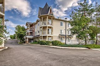 Photo 1: 9105 70 Panamount Drive NW in Calgary: Panorama Hills Apartment for sale : MLS®# A2070467