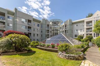 Photo 1: 307 2575 WARE Street in Abbotsford: Central Abbotsford Condo for sale in "The Maples" : MLS®# R2875147