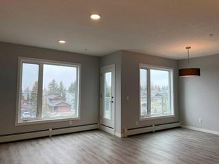 Photo 2: 412 200 Shawnee Square SW in Calgary: Shawnee Slopes Apartment for sale : MLS®# A2119079