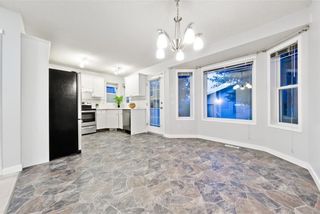 Photo 11: 167 BRIDLEWOOD CM SW in Calgary: Bridlewood House for sale