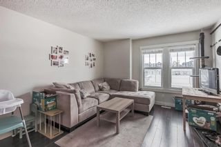 Photo 10: 111 Fireside Parkway: Cochrane Row/Townhouse for sale : MLS®# A2103361