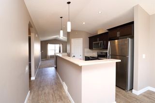 Photo 11: 419 Henricks Drive: Irricana Semi Detached (Half Duplex) for sale : MLS®# A1225048