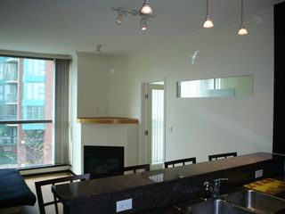 Photo 3: 202 928 Richards St in The Savoy: Downtown Home for sale () 
