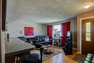 Photo 4: 7611 34 Avenue NW in Calgary: Bowness Detached for sale : MLS®# A1244910