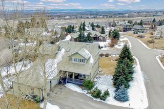 Photo 1: 219 Slopeview Drive SW in Calgary: Springbank Hill Detached for sale : MLS®# A1187658