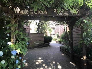 Photo 1: 3311 MOUNTAIN Highway in North Vancouver: Lynn Valley Townhouse for sale in "VILLAGE ON THE CREEK" : MLS®# R2287657