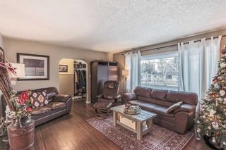 Photo 7: 2031 37 Street SW in Calgary: Glendale Detached for sale : MLS®# A2097225