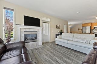 Photo 8: 406 8000 Wentworth Drive SW in Calgary: West Springs Row/Townhouse for sale : MLS®# A2002880
