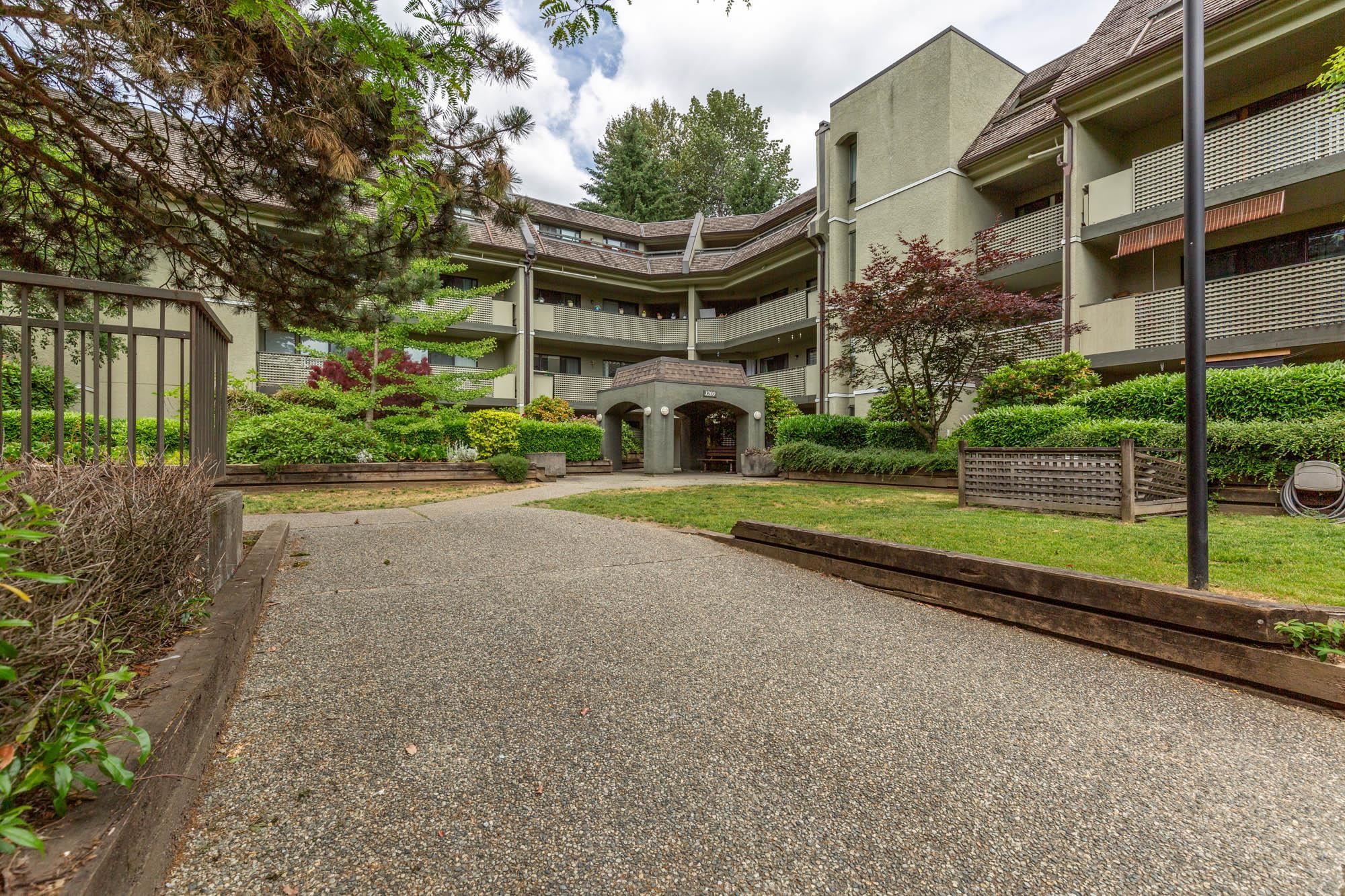 Main Photo: 414 1200 PACIFIC Street in Coquitlam: North Coquitlam Condo for sale in "GLENVIEW MANOR" : MLS®# R2787705