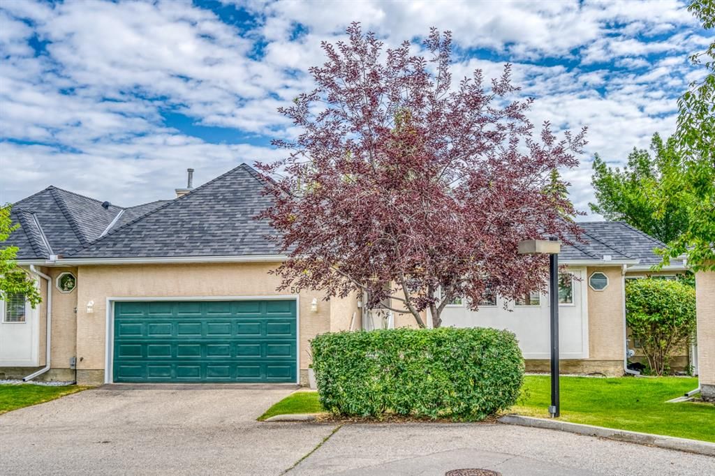 Main Photo: 50 Candle Terrace SW in Calgary: Canyon Meadows Semi Detached for sale : MLS®# A1243233