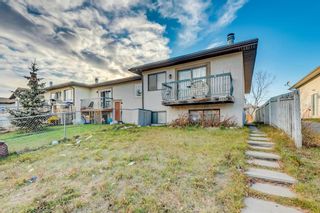 Main Photo: E 1403 44 Street SE in Calgary: Forest Lawn Row/Townhouse for sale : MLS®# A2009897
