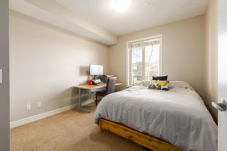 Photo 19: 3206 15 Sunset Square: Cochrane Apartment for sale : MLS®# A2120249