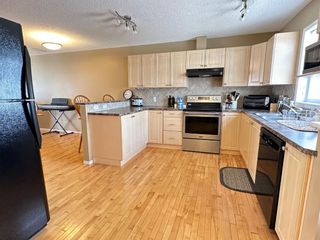 Photo 6: 305 Prairie Sound Circle NW: High River Row/Townhouse for sale : MLS®# A2130103