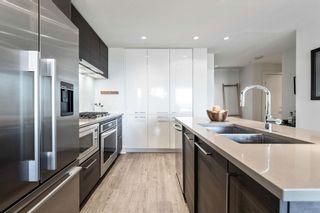Photo 7: 909 38 9 Street NE in Calgary: Bridgeland/Riverside Apartment for sale : MLS®# A2045779