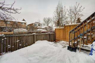 Photo 23: 143 Woodvale Bay SW in Calgary: Woodlands Row/Townhouse for sale : MLS®# A2022754