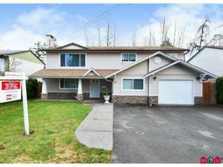 Photo 1: 10310 143RD Street in Surrey: Whalley House for sale (North Surrey)  : MLS®# F1228954