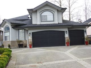 Photo 1: 8489 141A Street in Surrey: Bear Creek Green Timbers House for sale in "Brookside" : MLS®# R2531335