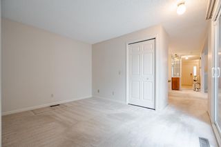 Photo 24: 74 Woodmeadow Close SW in Calgary: Woodlands Row/Townhouse for sale : MLS®# A2044732