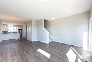 Photo 9: 121 301 REDSTONE Boulevard in Calgary: Redstone Row/Townhouse for sale : MLS®# A1246267