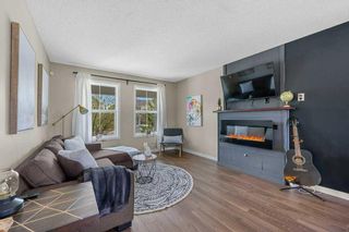 Photo 10: 60 Sunset Road: Cochrane Row/Townhouse for sale : MLS®# A2115454