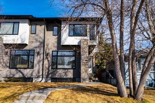 Photo 1: 2136 52 Avenue SW in Calgary: North Glenmore Park Semi Detached (Half Duplex) for sale : MLS®# A1239441