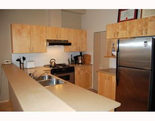 Photo 3: 103 980 W 22ND Avenue in Vancouver: Cambie Condo for sale in "SIMON LOFTS" (Vancouver West)  : MLS®# V785573