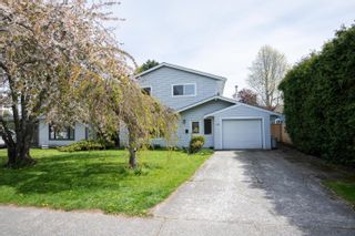 Photo 1: 4486 61 Street in Delta: Holly House for sale (Ladner)  : MLS®# R2874693