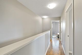 Photo 15: 731 101 Sunset Drive: Cochrane Row/Townhouse for sale : MLS®# A1245717