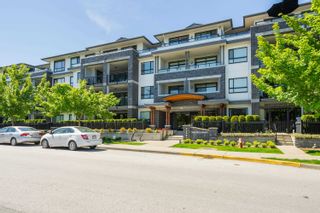 Photo 1: 403 22087 49 Avenue in Langley: Murrayville Condo for sale : MLS®# R2871979